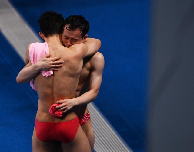 百度体育nba-梦之队男单3米板揽金银 “绝代双骄”捍卫霸主地位